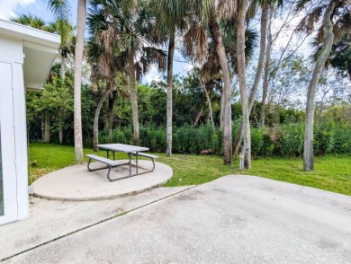 This RV site features an 11'x15' Fflorida Room with a 79' long on The Great Outdoors Golf and Country Club in Florida - for sale on GolfHomes.com, golf home, golf lot