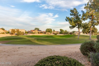 Experience resort-style living with this elegant home offering on Sun City Grand Golf Couse and Club in Arizona - for sale on GolfHomes.com, golf home, golf lot