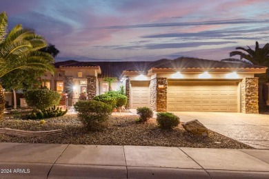 Experience resort-style living with this elegant home offering on Sun City Grand Golf Couse and Club in Arizona - for sale on GolfHomes.com, golf home, golf lot