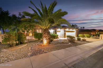 Experience resort-style living with this elegant home offering on Sun City Grand Golf Couse and Club in Arizona - for sale on GolfHomes.com, golf home, golf lot