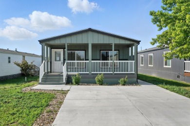 Listed by Michelle Carr  Lori Barnett, Engel  Volkers Black on Rapid City Elks Golf Course in South Dakota - for sale on GolfHomes.com, golf home, golf lot