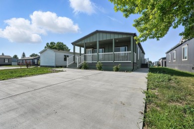 Listed by Michelle Carr  Lori Barnett, Engel  Volkers Black on Rapid City Elks Golf Course in South Dakota - for sale on GolfHomes.com, golf home, golf lot