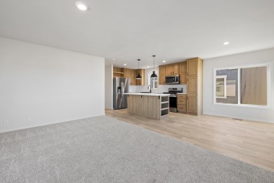 Discover a fresh, low-maintenance lifestyle in this newly on Rapid City Elks Golf Course in South Dakota - for sale on GolfHomes.com, golf home, golf lot