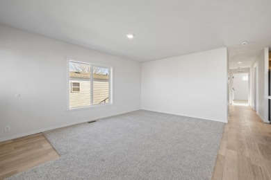 Discover a fresh, low-maintenance lifestyle in this newly on Rapid City Elks Golf Course in South Dakota - for sale on GolfHomes.com, golf home, golf lot