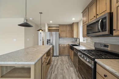 Discover a fresh, low-maintenance lifestyle in this newly on  in South Dakota - for sale on GolfHomes.com, golf home, golf lot