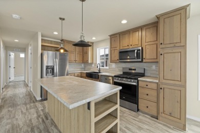 Discover a fresh, low-maintenance lifestyle in this newly on  in South Dakota - for sale on GolfHomes.com, golf home, golf lot