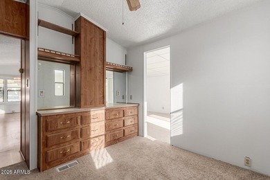 This move-in-ready home offers peace of mind with a brand-new AC on Great Eagle Golf Club in Arizona - for sale on GolfHomes.com, golf home, golf lot