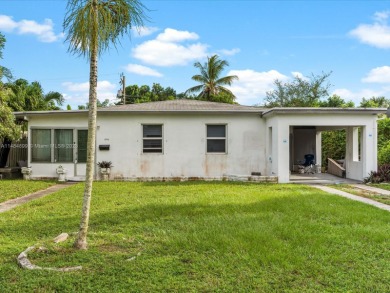 (LOCATION, LOCATION: PRICED TO SELL): This semi-remodeled home on Greynolds Park Golf Course in Florida - for sale on GolfHomes.com, golf home, golf lot
