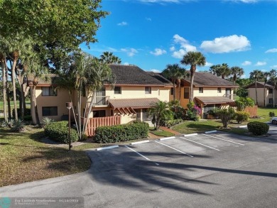 Not to be missed bright and airy upstairs 2-bedroom 2 bath unit on Fountains Golf and Country Club in Florida - for sale on GolfHomes.com, golf home, golf lot