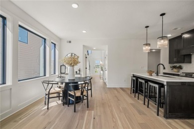 Discover modern, low-maintenance luxury living in this stunning on The Golf Club of Kansas in Kansas - for sale on GolfHomes.com, golf home, golf lot