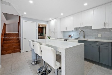 This appealing move-in ready townhome located in desirable on Pine Island Ridge Country Club in Florida - for sale on GolfHomes.com, golf home, golf lot