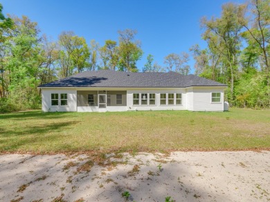 Exquisite new construction overlooking hole 6 of the new, state on Wildwood Country Club in Florida - for sale on GolfHomes.com, golf home, golf lot