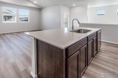 Lock & leave! Move-in ready and designed for low-maintenance on Raindance National Golf Course in Colorado - for sale on GolfHomes.com, golf home, golf lot