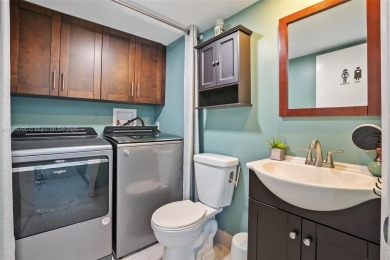 This appealing move-in ready townhome located in desirable on Pine Island Ridge Country Club in Florida - for sale on GolfHomes.com, golf home, golf lot