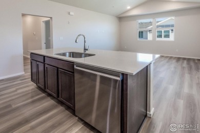 Lock & leave! Move-in ready and designed for low-maintenance on Raindance National Golf Course in Colorado - for sale on GolfHomes.com, golf home, golf lot