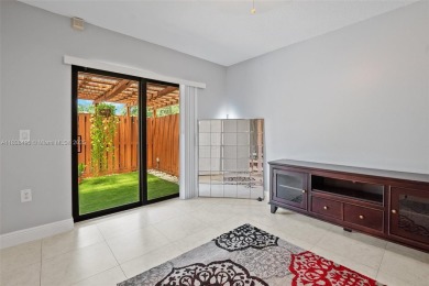 This appealing move-in ready townhome located in desirable on Pine Island Ridge Country Club in Florida - for sale on GolfHomes.com, golf home, golf lot
