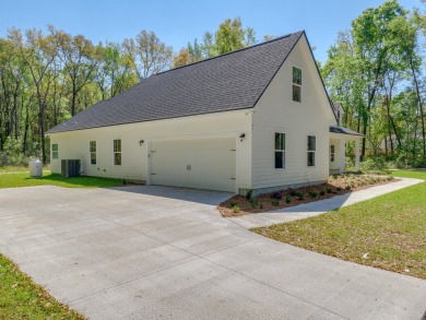 Exquisite new construction overlooking hole 6 of the new, state on Wildwood Country Club in Florida - for sale on GolfHomes.com, golf home, golf lot