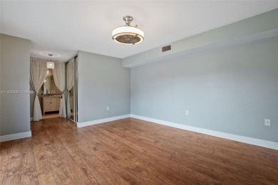 This appealing move-in ready townhome located in desirable on Pine Island Ridge Country Club in Florida - for sale on GolfHomes.com, golf home, golf lot