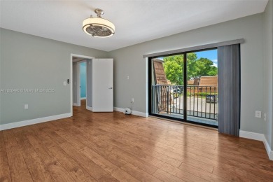 This appealing move-in ready townhome located in desirable on Pine Island Ridge Country Club in Florida - for sale on GolfHomes.com, golf home, golf lot