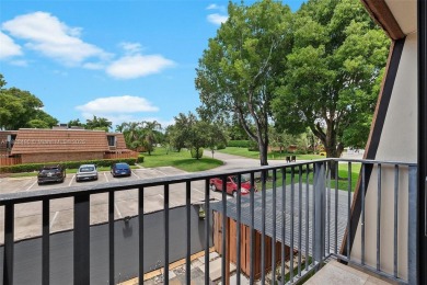This appealing move-in ready townhome located in desirable on Pine Island Ridge Country Club in Florida - for sale on GolfHomes.com, golf home, golf lot