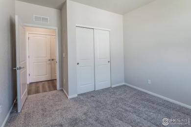 Lock & leave! Move-in ready and designed for low-maintenance on Raindance National Golf Course in Colorado - for sale on GolfHomes.com, golf home, golf lot