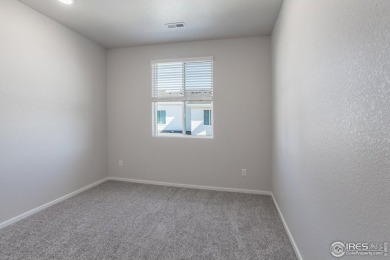 Lock & leave! Move-in ready and designed for low-maintenance on Raindance National Golf Course in Colorado - for sale on GolfHomes.com, golf home, golf lot