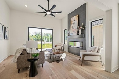 Discover modern, low-maintenance luxury living in this stunning on The Golf Club of Kansas in Kansas - for sale on GolfHomes.com, golf home, golf lot