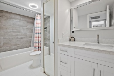 This appealing move-in ready townhome located in desirable on Pine Island Ridge Country Club in Florida - for sale on GolfHomes.com, golf home, golf lot