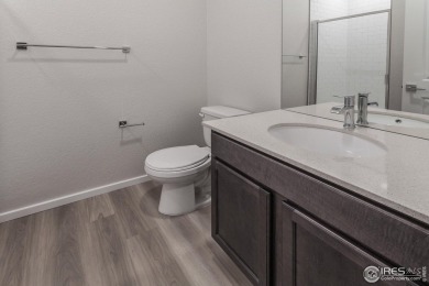Lock & leave! Move-in ready and designed for low-maintenance on Raindance National Golf Course in Colorado - for sale on GolfHomes.com, golf home, golf lot