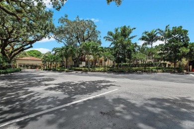 This appealing move-in ready townhome located in desirable on Pine Island Ridge Country Club in Florida - for sale on GolfHomes.com, golf home, golf lot