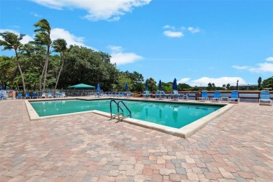 This appealing move-in ready townhome located in desirable on Pine Island Ridge Country Club in Florida - for sale on GolfHomes.com, golf home, golf lot