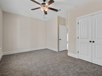 Exquisite new construction overlooking hole 6 of the new, state on Wildwood Country Club in Florida - for sale on GolfHomes.com, golf home, golf lot