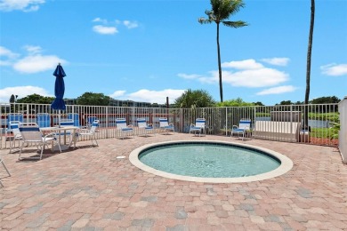 This appealing move-in ready townhome located in desirable on Pine Island Ridge Country Club in Florida - for sale on GolfHomes.com, golf home, golf lot