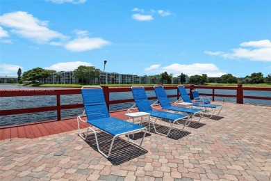 This appealing move-in ready townhome located in desirable on Pine Island Ridge Country Club in Florida - for sale on GolfHomes.com, golf home, golf lot