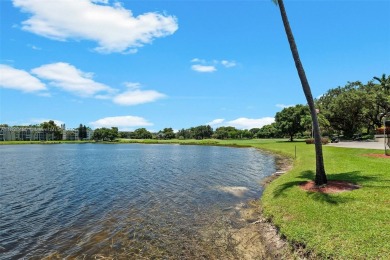 This appealing move-in ready townhome located in desirable on Pine Island Ridge Country Club in Florida - for sale on GolfHomes.com, golf home, golf lot