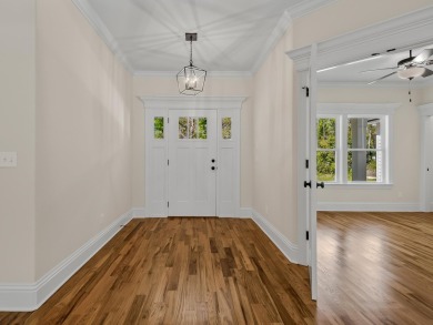 Exquisite new construction overlooking hole 6 of the new, state on Wildwood Country Club in Florida - for sale on GolfHomes.com, golf home, golf lot
