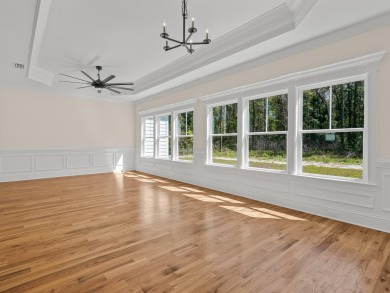 Exquisite new construction overlooking hole 6 of the new, state on Wildwood Country Club in Florida - for sale on GolfHomes.com, golf home, golf lot