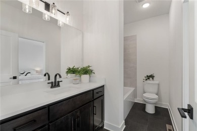 Discover modern, low-maintenance luxury living in this stunning on The Golf Club of Kansas in Kansas - for sale on GolfHomes.com, golf home, golf lot