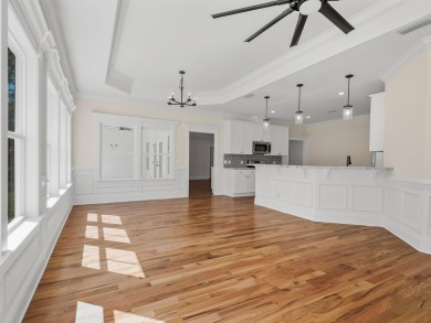 Exquisite new construction overlooking hole 6 of the new, state on Wildwood Country Club in Florida - for sale on GolfHomes.com, golf home, golf lot
