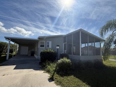 Spacious mobile home in a desirable and active community.  Step on Water Oak Country Club Estates in Florida - for sale on GolfHomes.com, golf home, golf lot