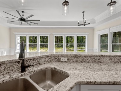Exquisite new construction overlooking hole 6 of the new, state on Wildwood Country Club in Florida - for sale on GolfHomes.com, golf home, golf lot