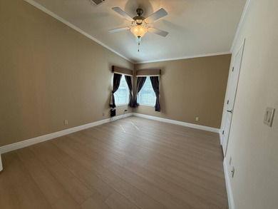 Spacious mobile home in a desirable and active community.  Step on Water Oak Country Club Estates in Florida - for sale on GolfHomes.com, golf home, golf lot