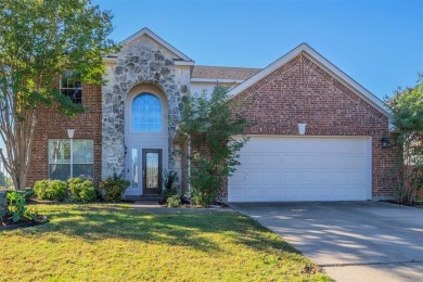 This stunning two-story home is located in the highly on Mansfield National Golf Club in Texas - for sale on GolfHomes.com, golf home, golf lot