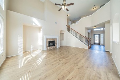 This stunning two-story home is located in the highly on Mansfield National Golf Club in Texas - for sale on GolfHomes.com, golf home, golf lot