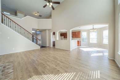 This stunning two-story home is located in the highly on Mansfield National Golf Club in Texas - for sale on GolfHomes.com, golf home, golf lot