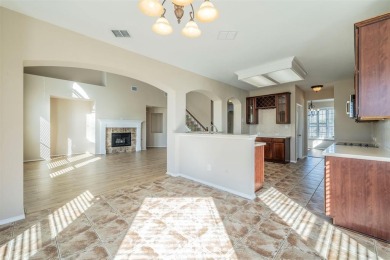 This stunning two-story home is located in the highly on Mansfield National Golf Club in Texas - for sale on GolfHomes.com, golf home, golf lot