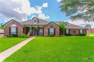 Absolutely stunning inside and out located in beautiful on Hills of Cove Municipal Golf Course in Texas - for sale on GolfHomes.com, golf home, golf lot