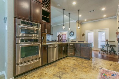 Absolutely stunning inside and out located in beautiful on Hills of Cove Municipal Golf Course in Texas - for sale on GolfHomes.com, golf home, golf lot