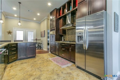 Absolutely stunning inside and out located in beautiful on Hills of Cove Municipal Golf Course in Texas - for sale on GolfHomes.com, golf home, golf lot