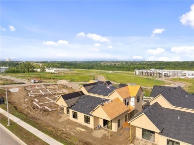 Discover modern, low-maintenance luxury living in this stunning on The Golf Club of Kansas in Kansas - for sale on GolfHomes.com, golf home, golf lot